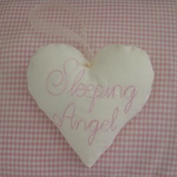 sleeping angel lettering padded heart hanging ornament made in the machine embroidery hoop lavender filled linen heart needle passion embroidery npe