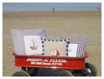 radio flyer wagon on a beach filled with seaside cushions machine embroidery nautical maritime seaside beach sea swimming fishing design art pes hus dst needle passion embroidery npe